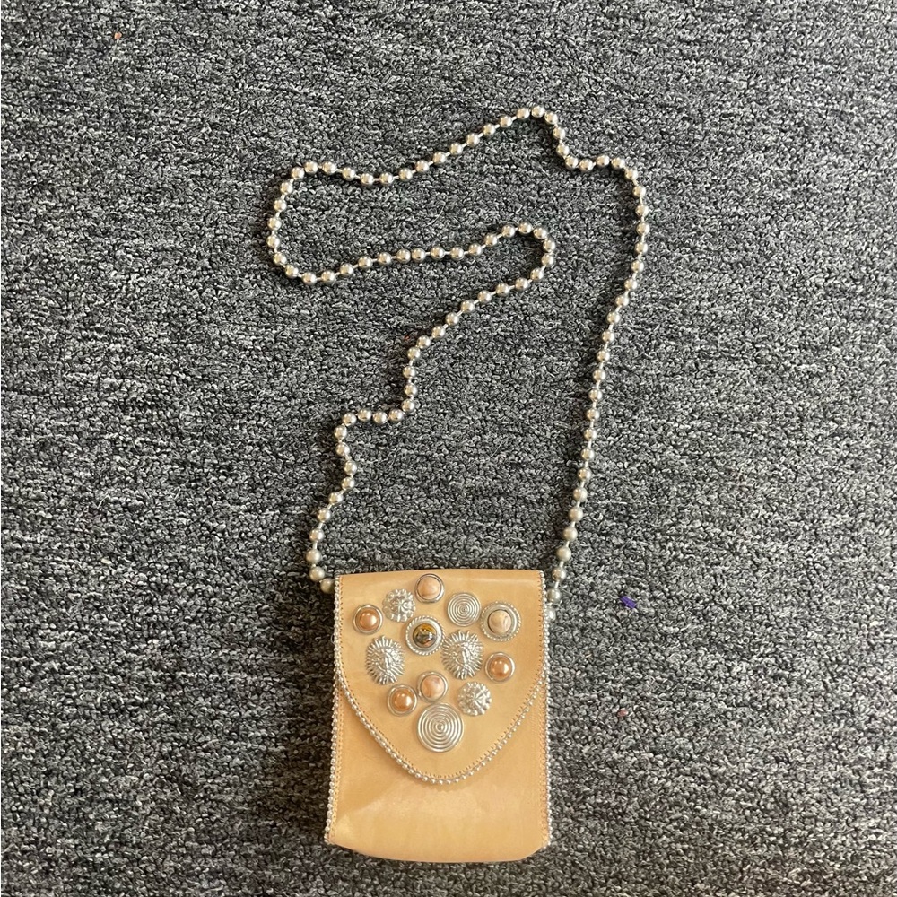 Nina Arjani Tan Leather Crossbody Bag with bead Chain Strap and eclectic design